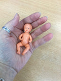 Vintage West German miniature jointed doll